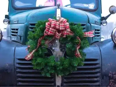 Christmas Wreath on Old Truck Our Specialities Christmas CateringTable Belfast Northern Ireland Caterers