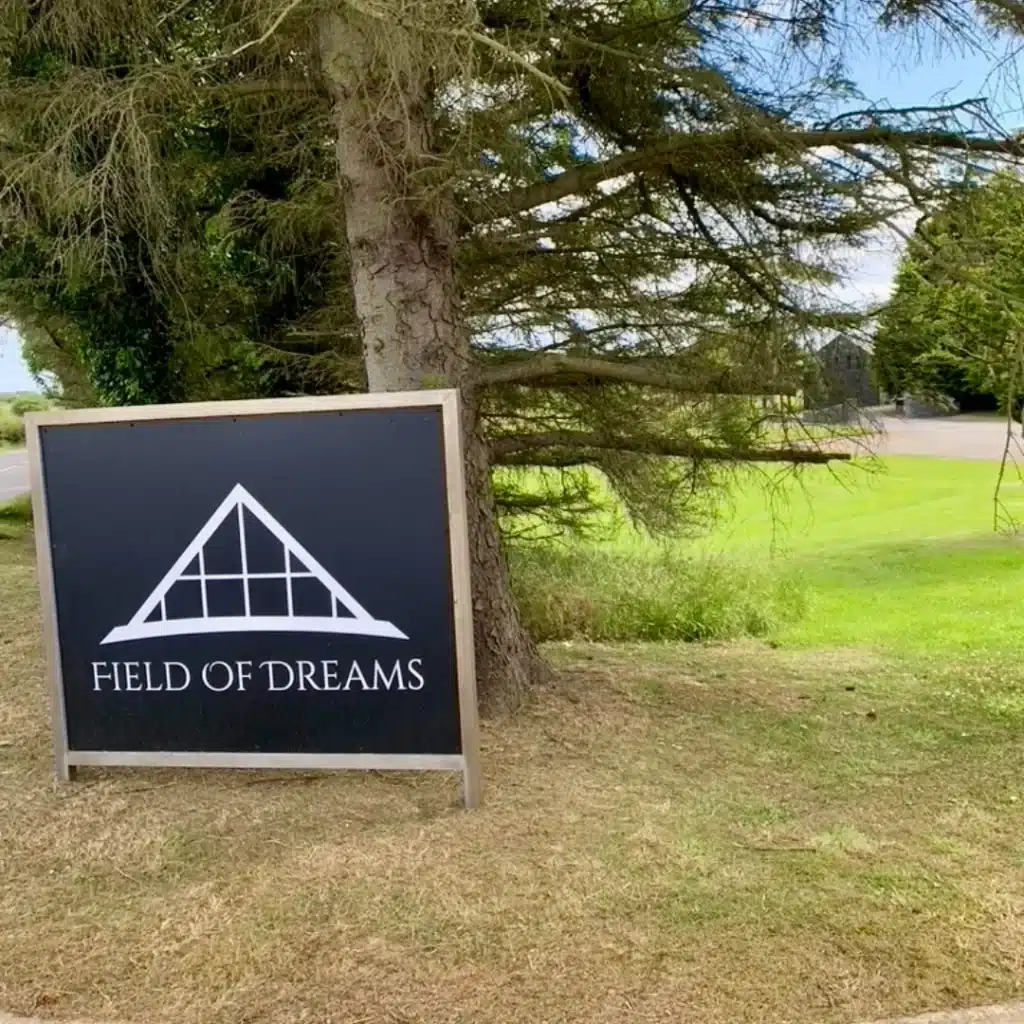 Field of Dreams venue sign Wedding BBQ Catering Table